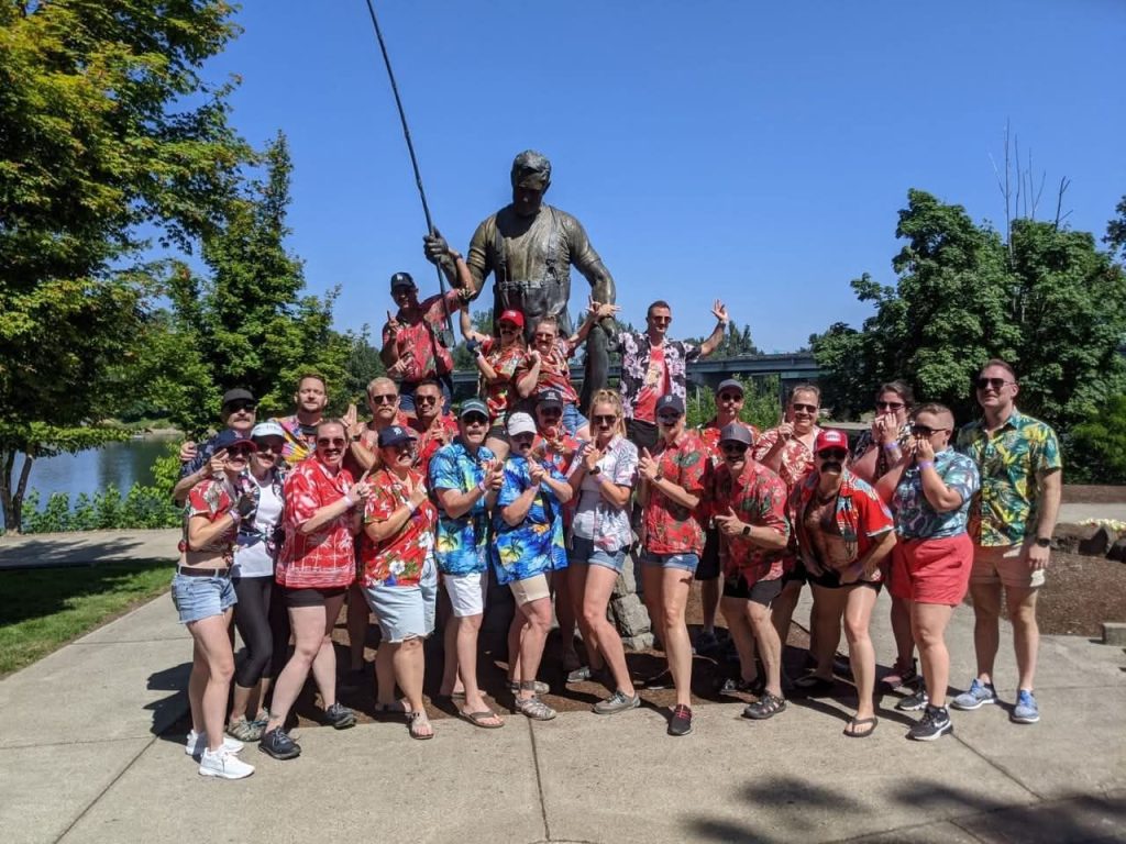 Crew in Hawaiian shirts as Magnum PI