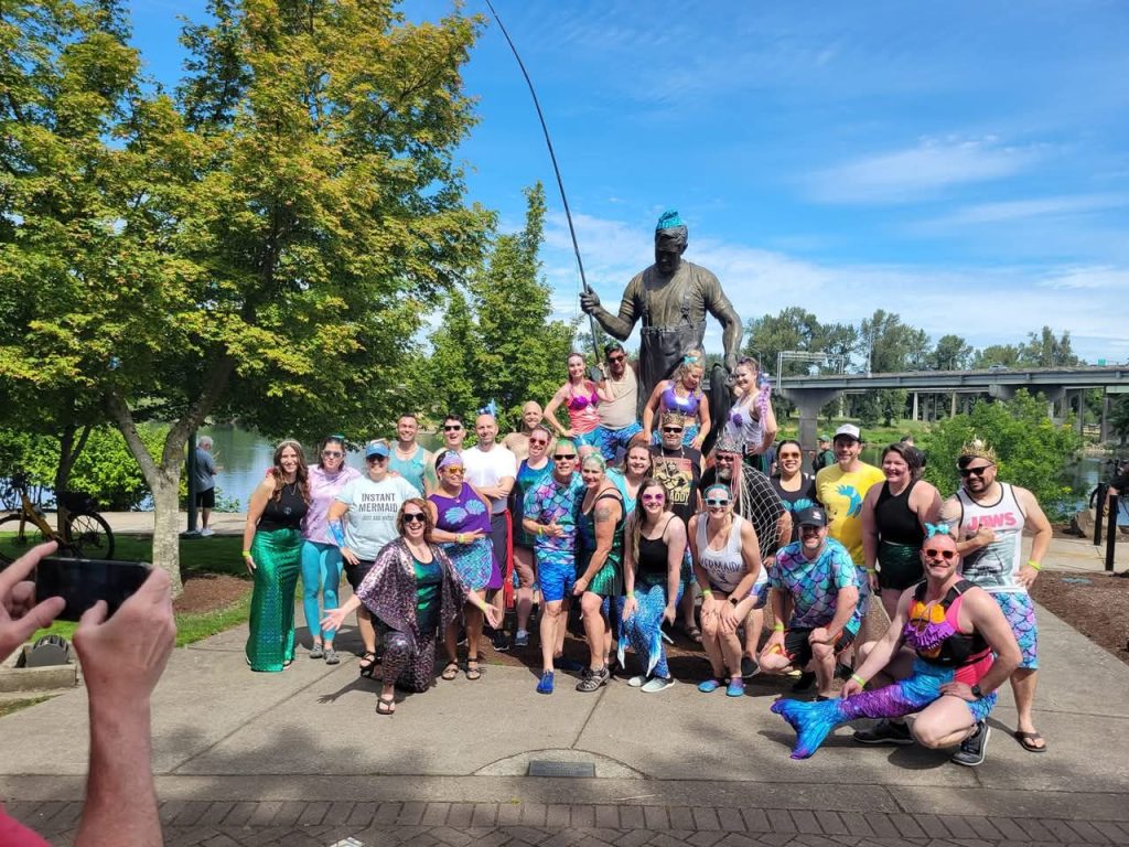 Crew dressed as mermaids